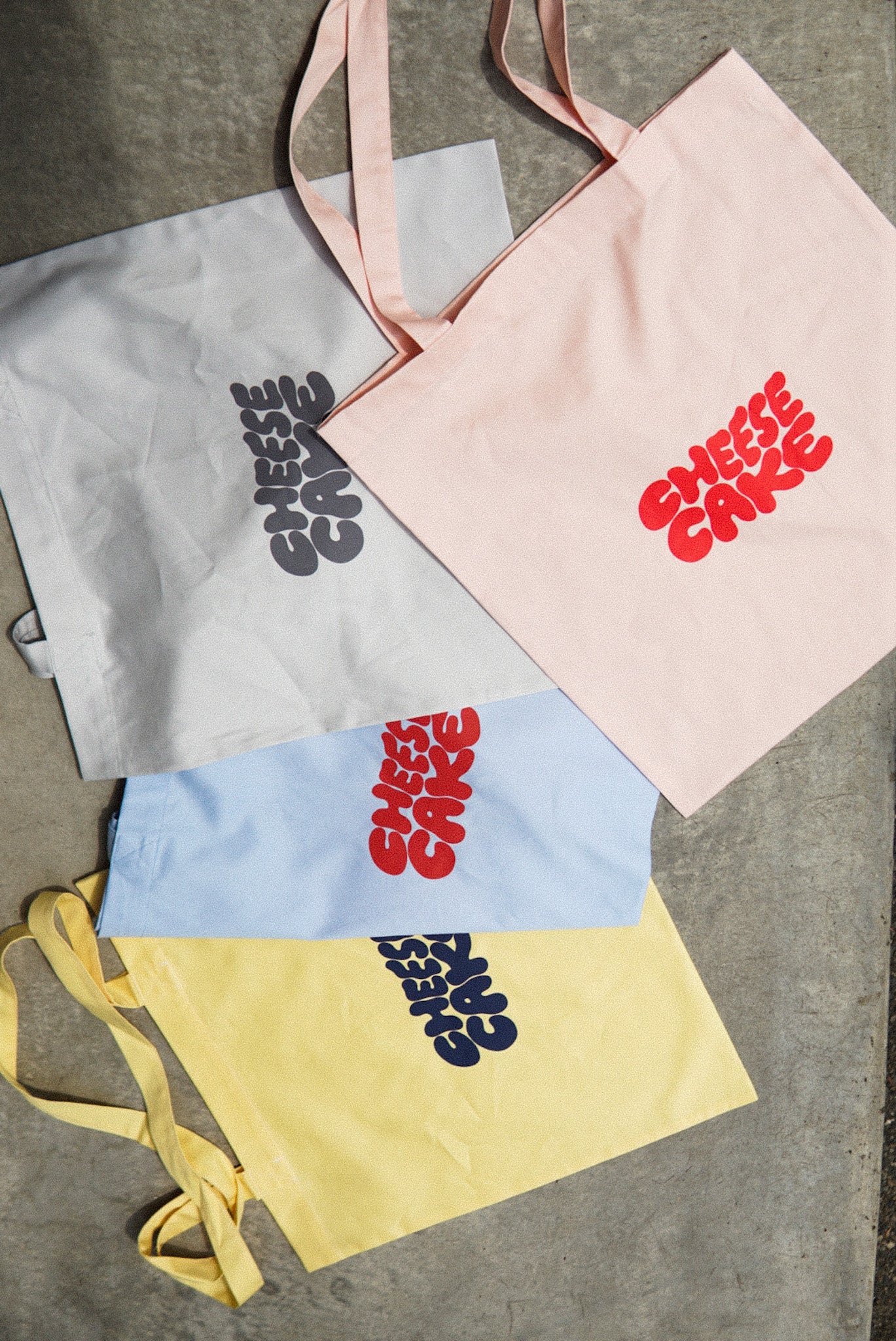 The SUN LIVES HERE トートバッグ｜公式グッズ / Tote Bag – cafe The